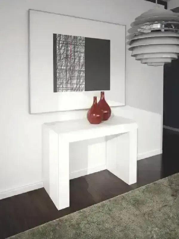 Decoração minimalista para corredor com aparador simples branco