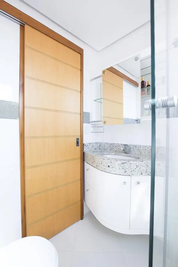 Armário de banheiro planejado pequeno com acabamento arredondado