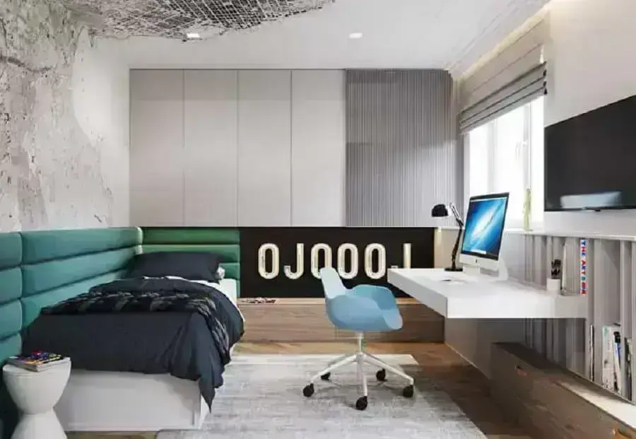 Decoração moderna com home office no quarto de solteiro planejado com bancada suspensa