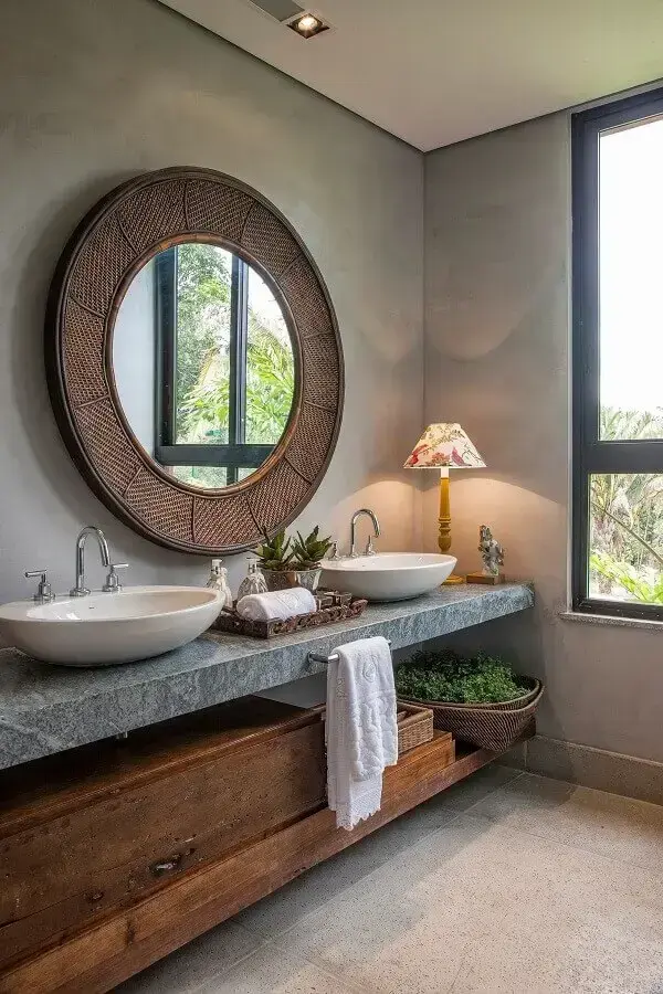 decoração de banheiro de cimento queimado com espelho redondo Foto Pinterest