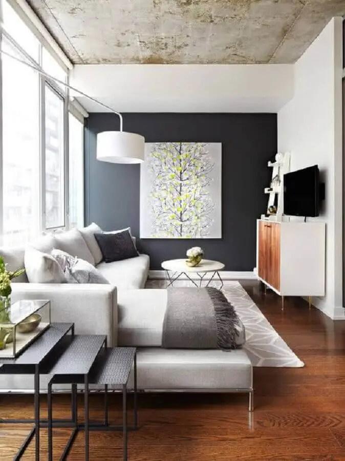 decoração de sala com sofá grande e mesa de centro redonda moderna Foto Pinterest