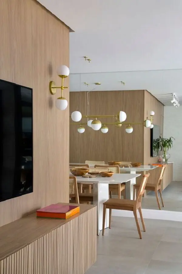 luminária de parede para sala de TV integrada com sala de jantar moderna Foto Casa de Valentina