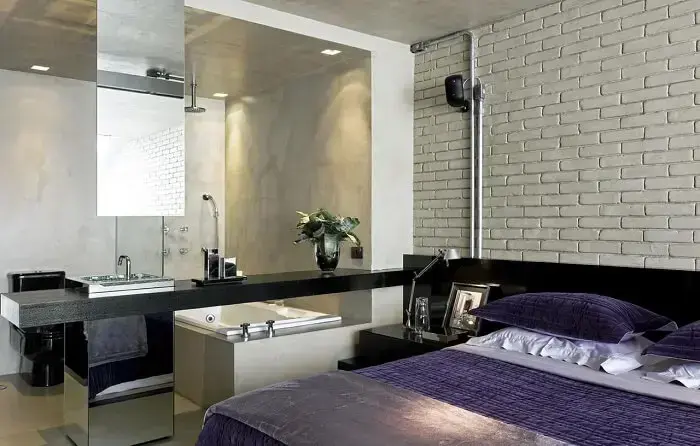 Banheiro suíte com decoração moderna e jovial. Projeto por Diego Revollo