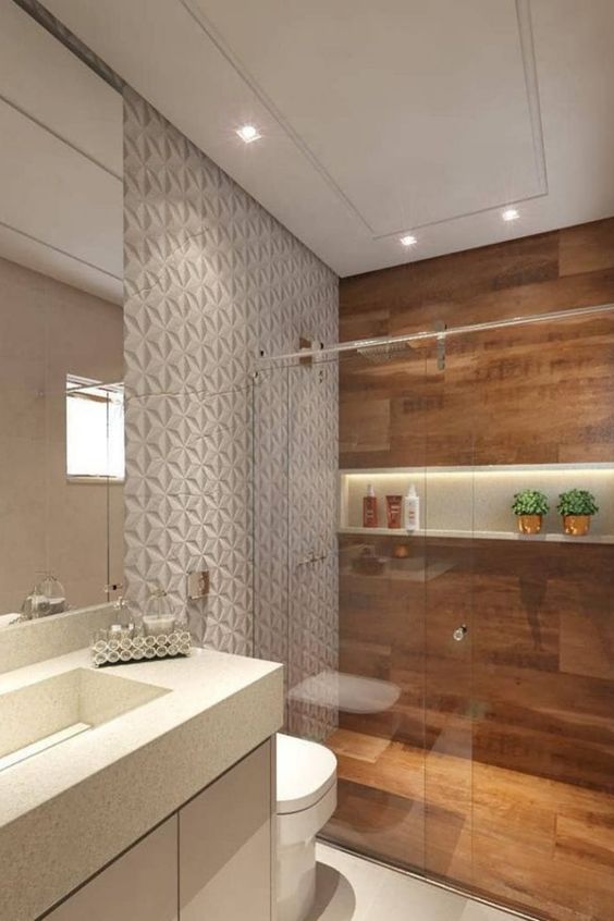 Banheiro com porcelanato 3D e box amadeirado 