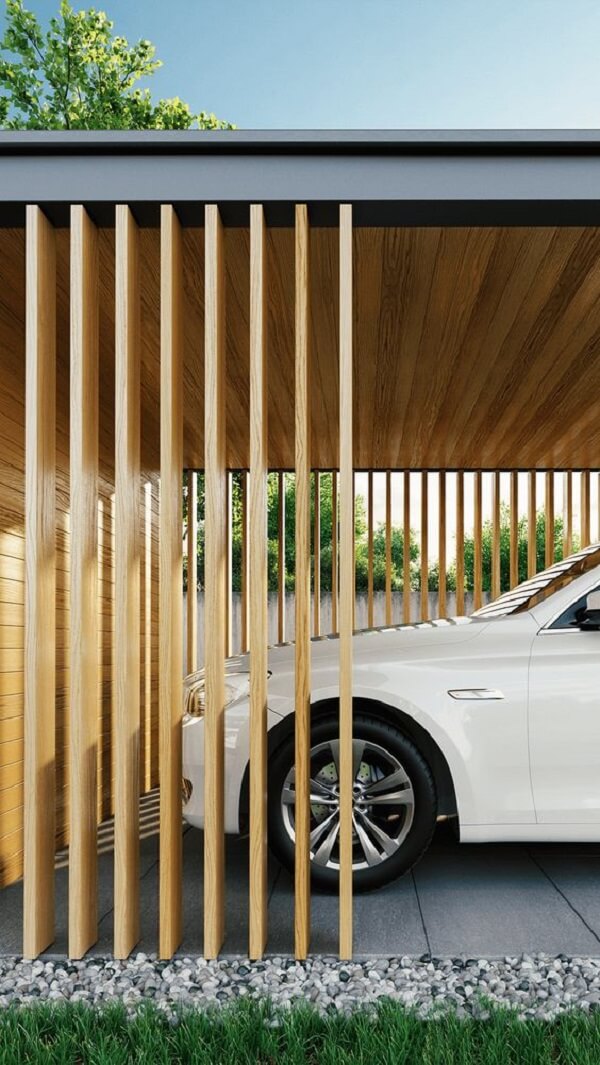 Modelo de cobertura para garagem com estrutura de metal e forro de madeira. Fonte: Pinterest