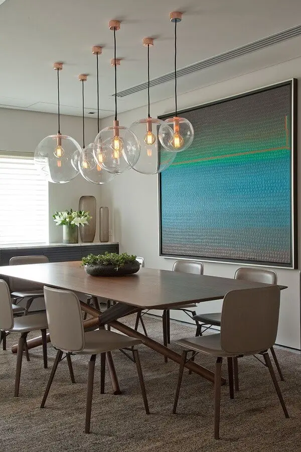 luminária pendente de vidro para sala de jantar moderna decorada com quadro grande Foto Casa de Valentina
