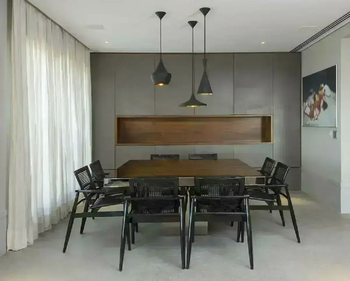 sala de jantar moderna decorada com mesa quadrada e cadeira de jantar com braço preta Foto Histórias de Casa