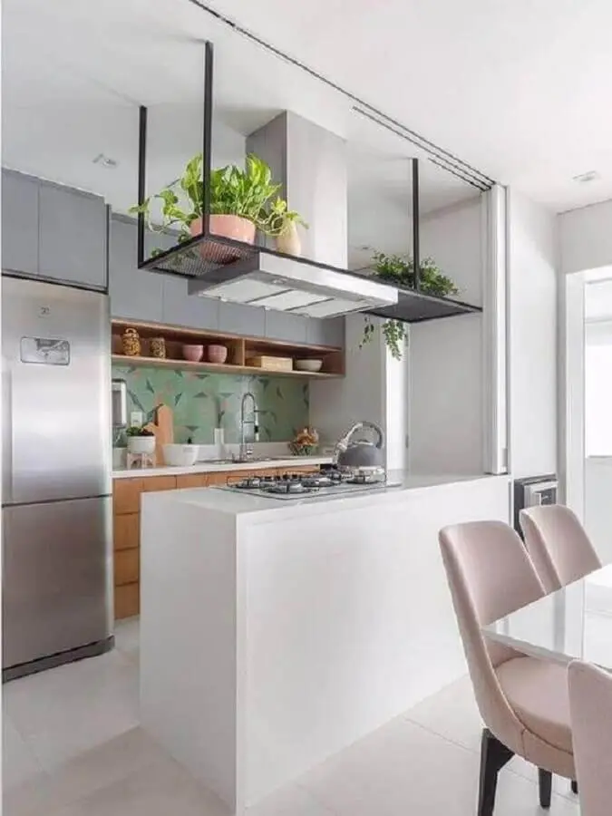 cozinha estilo americana pequena decorada com armários planejados Foto Jeito de Casa