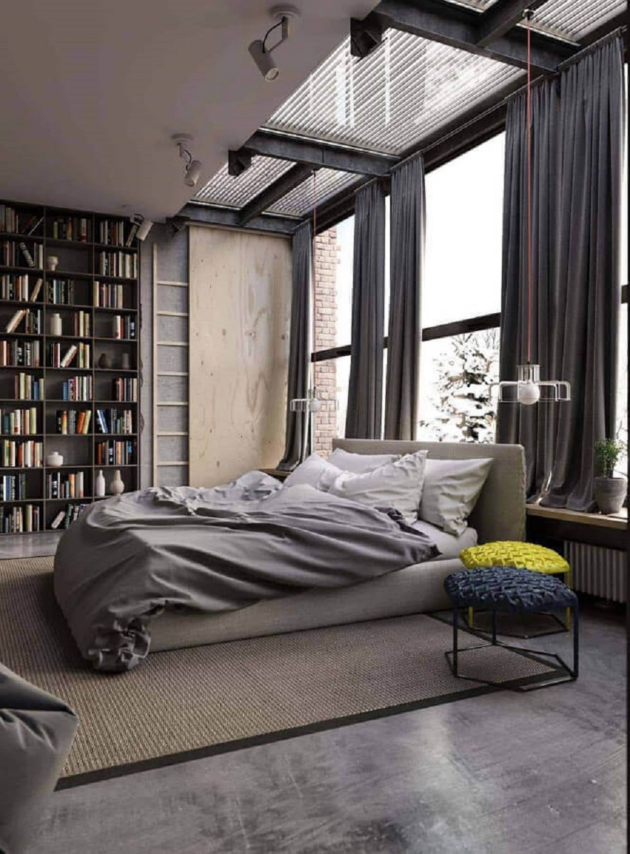 estilo industrial para quarto grande decorado com estante de livros Foto Lagom Studio