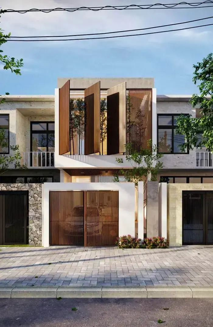 Casa moderna com cores para fachada branca com janelas e portão de madeira