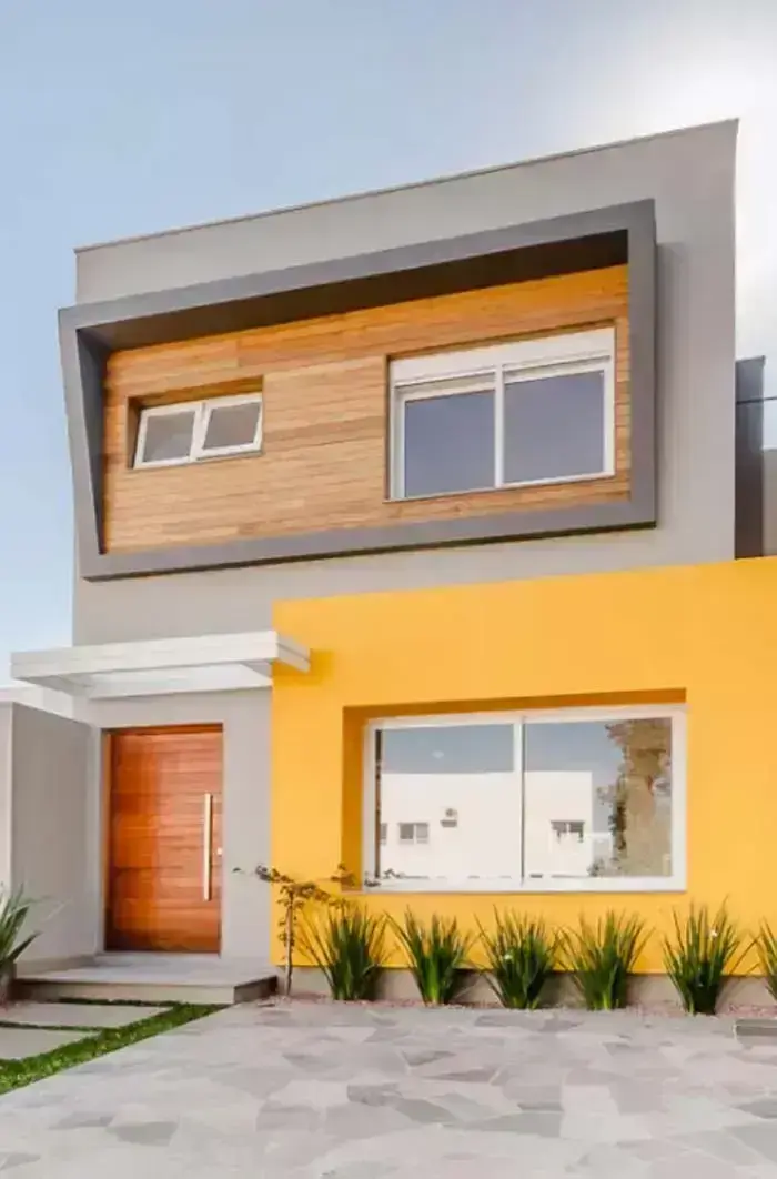 Combinação de cores para fachada de casas com cinza e amarelo