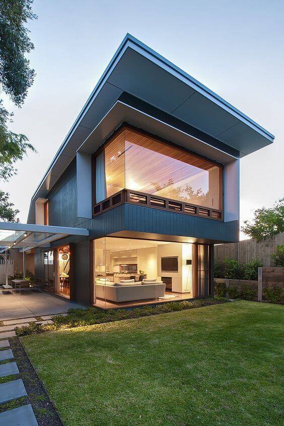 Cores para fachadas de casas modernas com porta de vidro para integrar a casa com o jardim