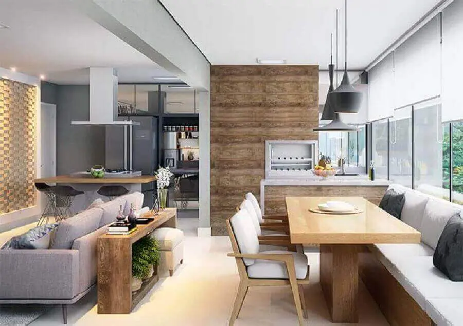 Decoração com lustre para área gourmet integrada com sala de estar e cozinha Foto Pinterest