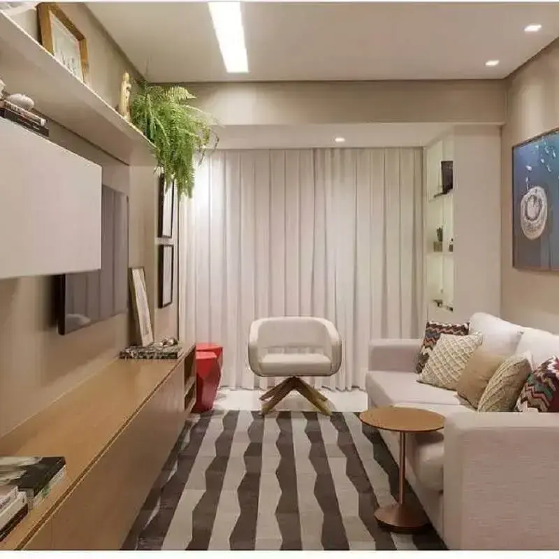 Decoração moderna com cores para sala de estar pequena e neutra Foto SD Arquitetura
