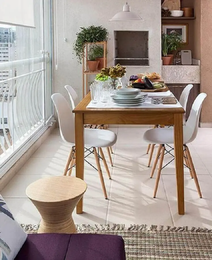 Decoração simples com cadeira eames para apartamento com varanda gourmet Foto Eu Capricho
