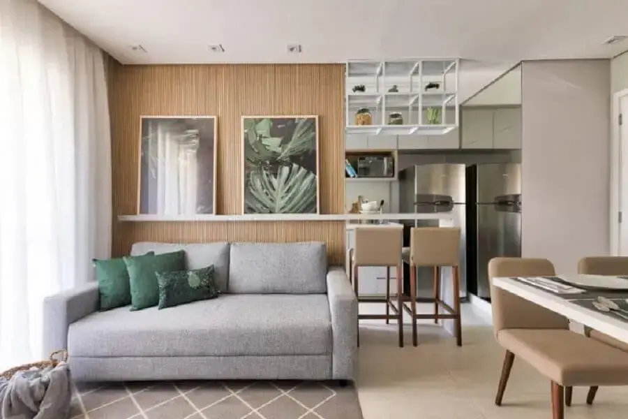 Sala de apartamento decorada com almofadas para sofá cinza pequeno Foto SP Estúdio