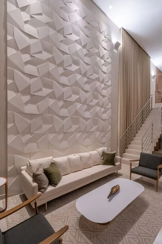 Sala de estar sofisticada com decoração de gesso 3D na parede