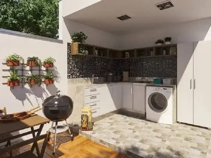 Área externa simples com lavanderia e churrasqueira portátil. Fonte: The Ofy