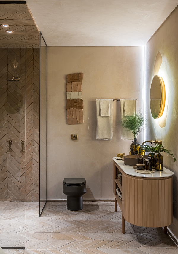 Banheiro moderno com cuba deca redonda e espelho de led