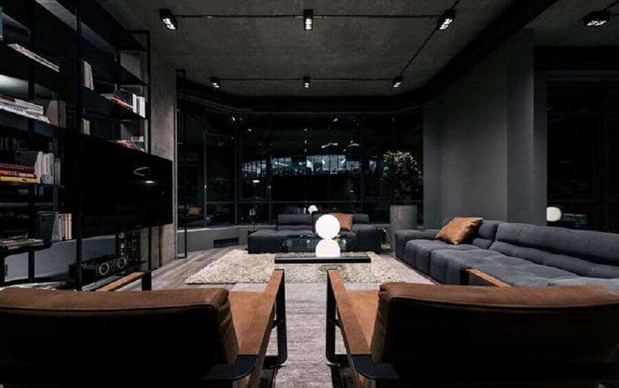 Cores de casas modernas decorada com sala preta com poltronas marrons Foto Futurist Architecture