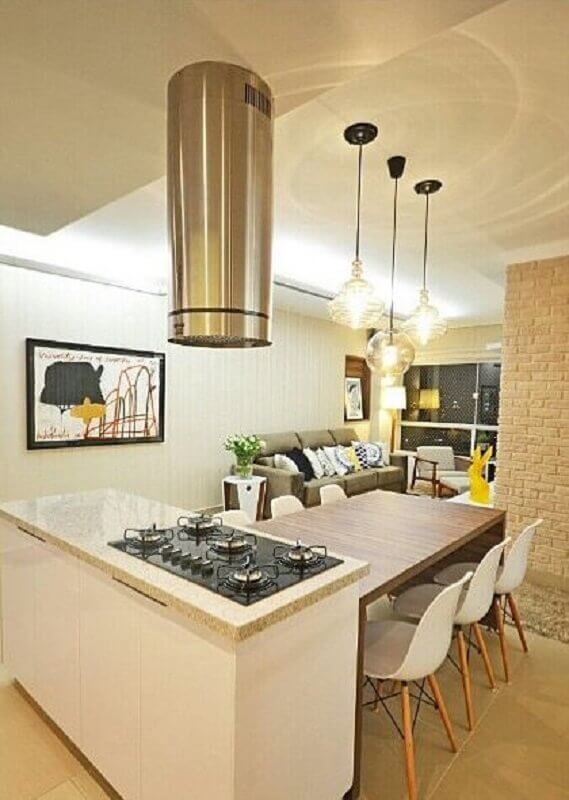 Ilha com cooktop e mesa para decoração de cozinha integrada a sala de estar Foto Decor Fácil