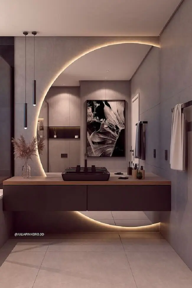 A iluminação do banheiro deve ser clara o suficiente para que este ambiente possa ser utilizado a qualquer hora do dia. Reprodução: Avant Júlia Pinheiro Arquitetura