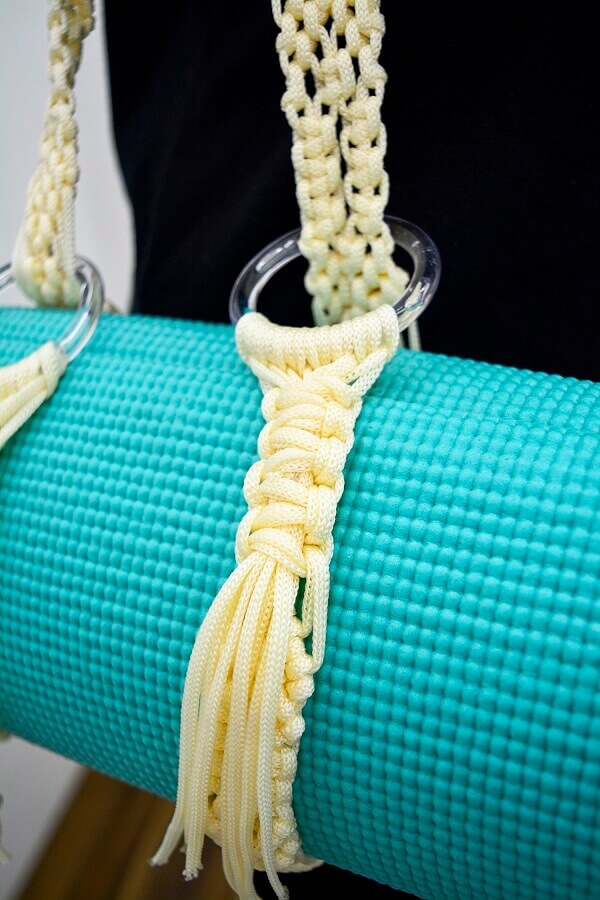 Corda feita de macramê para pendurar tapete de yoga Foto Círculo