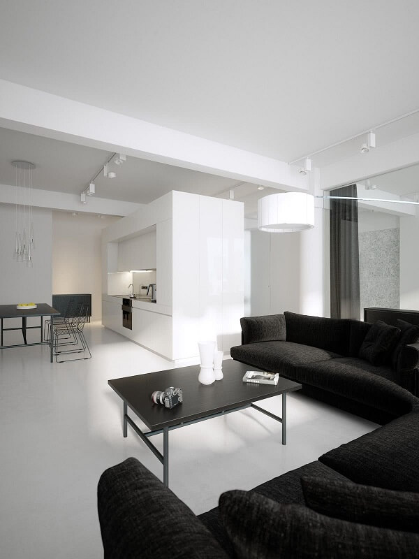 Decoração de sala preta e branca com sofá em l