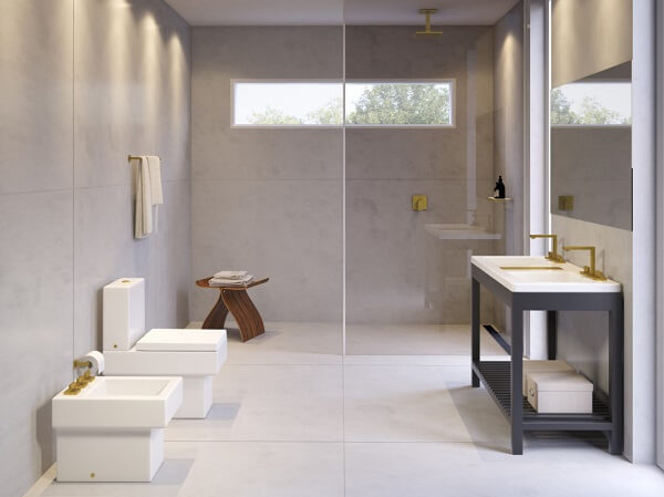 Banheiro luxuoso com diferentes tipos de chuveiro dourado para deixar a decoração mais luxuosa