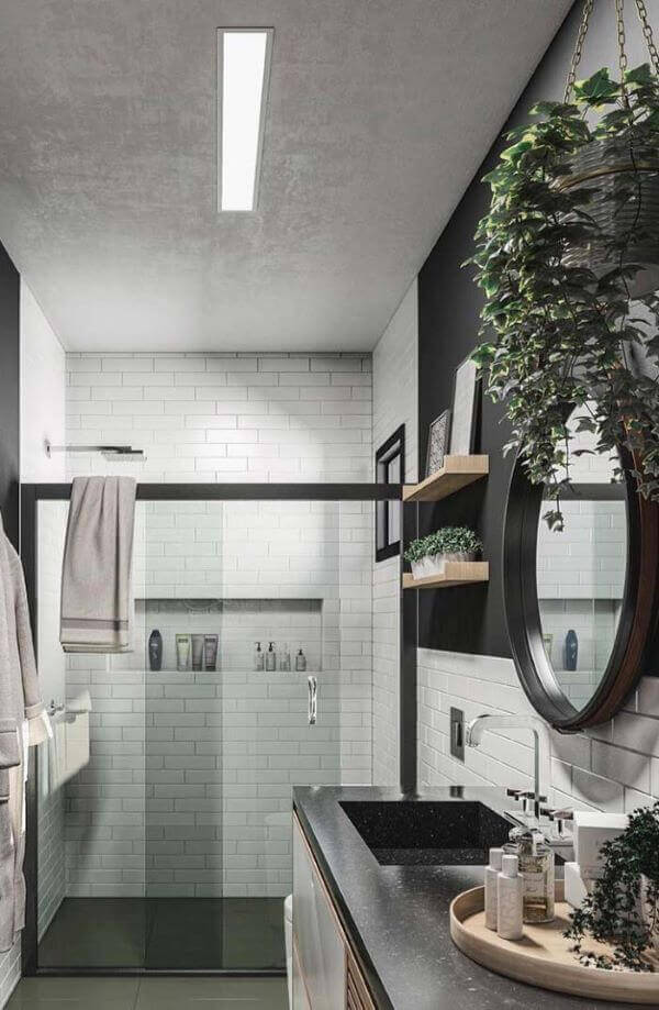 Banheiro moderno com cuba esculpida de porcelanato preta 