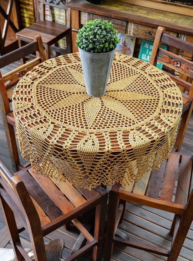 Decoração com toalha de mesa redonda de crochê Foto Circulo