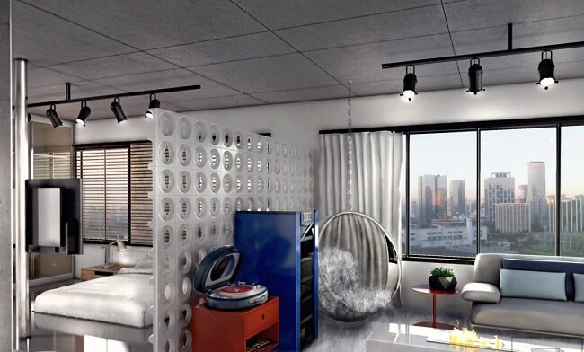 Os cobogós ajudam na divisão dos ambientes do apartamento studio. Fonte: Decor Fácil