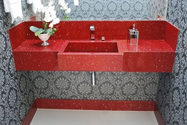 Granito vermelho estelar na pia esculpida do banheiro 