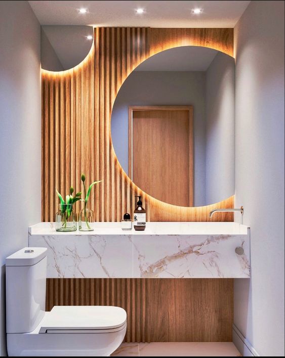 Pia de banheiro de marmore esculpida com torneira de parede