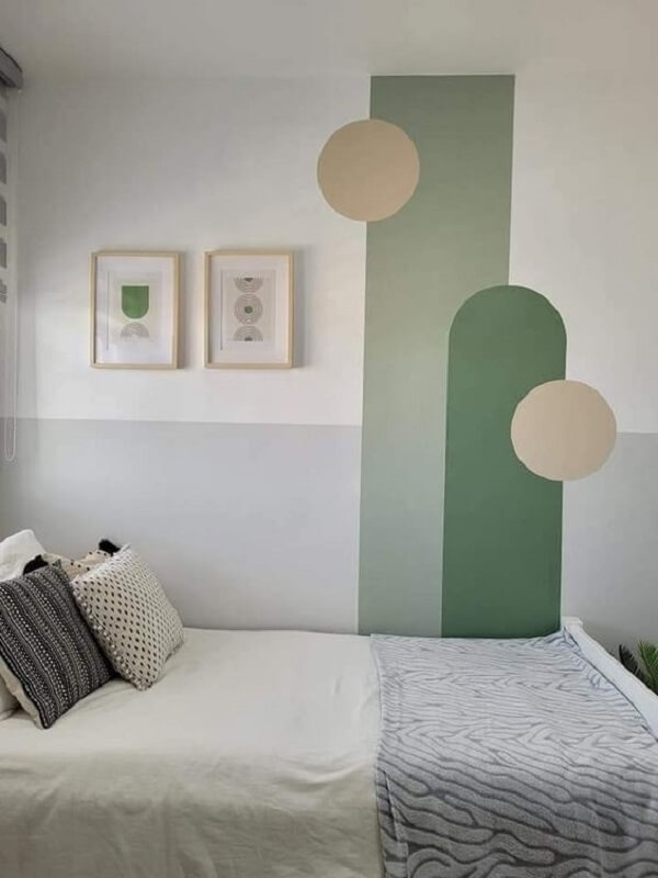 Dormitórios coloridos pintando parede com fita
