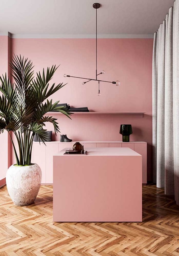 Cozinha planejada com bancada cor de rosa em pedra corian
