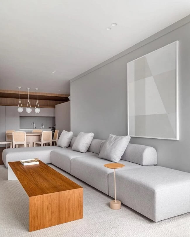 Ambiente integrado com sofá minimalista