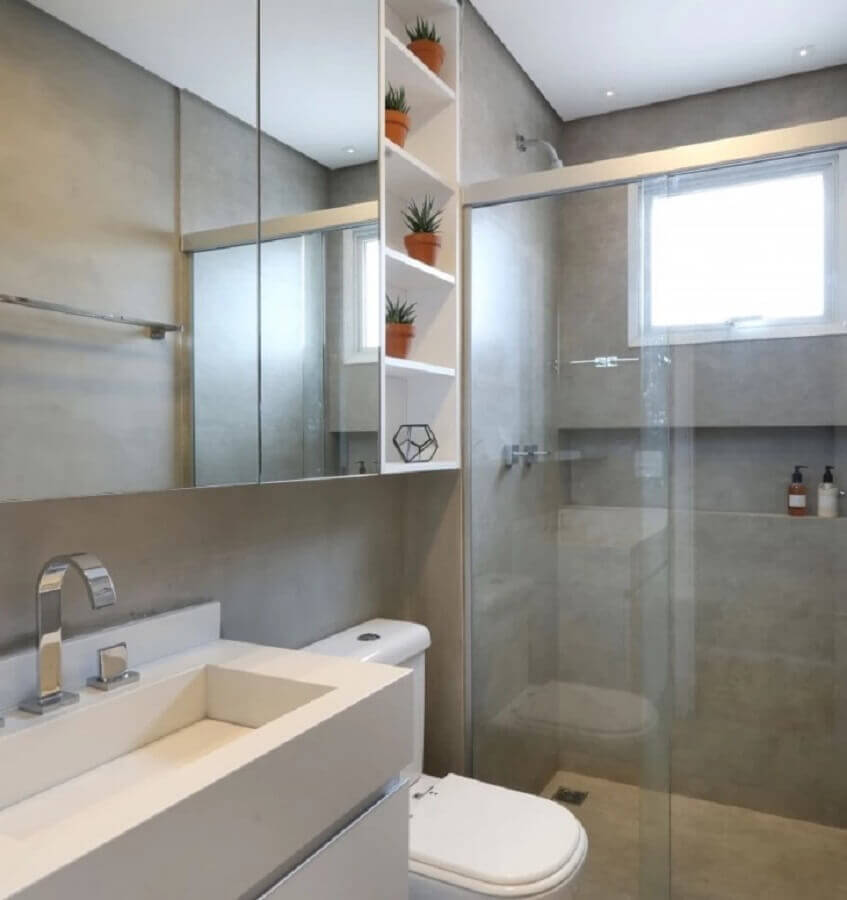 Decoração clean em cores claras para banheiros com nichos embutidos na parede Foto DOOB Arquitetura